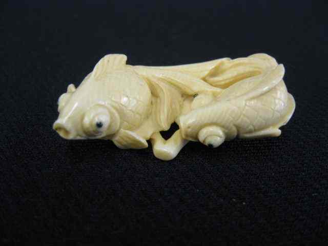 Appraisal: Carved Ivory Netsuke of Two Gold Fish onyx eyes ''