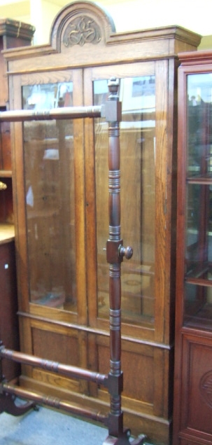 Appraisal: A th century oak display cabinet the arch top over