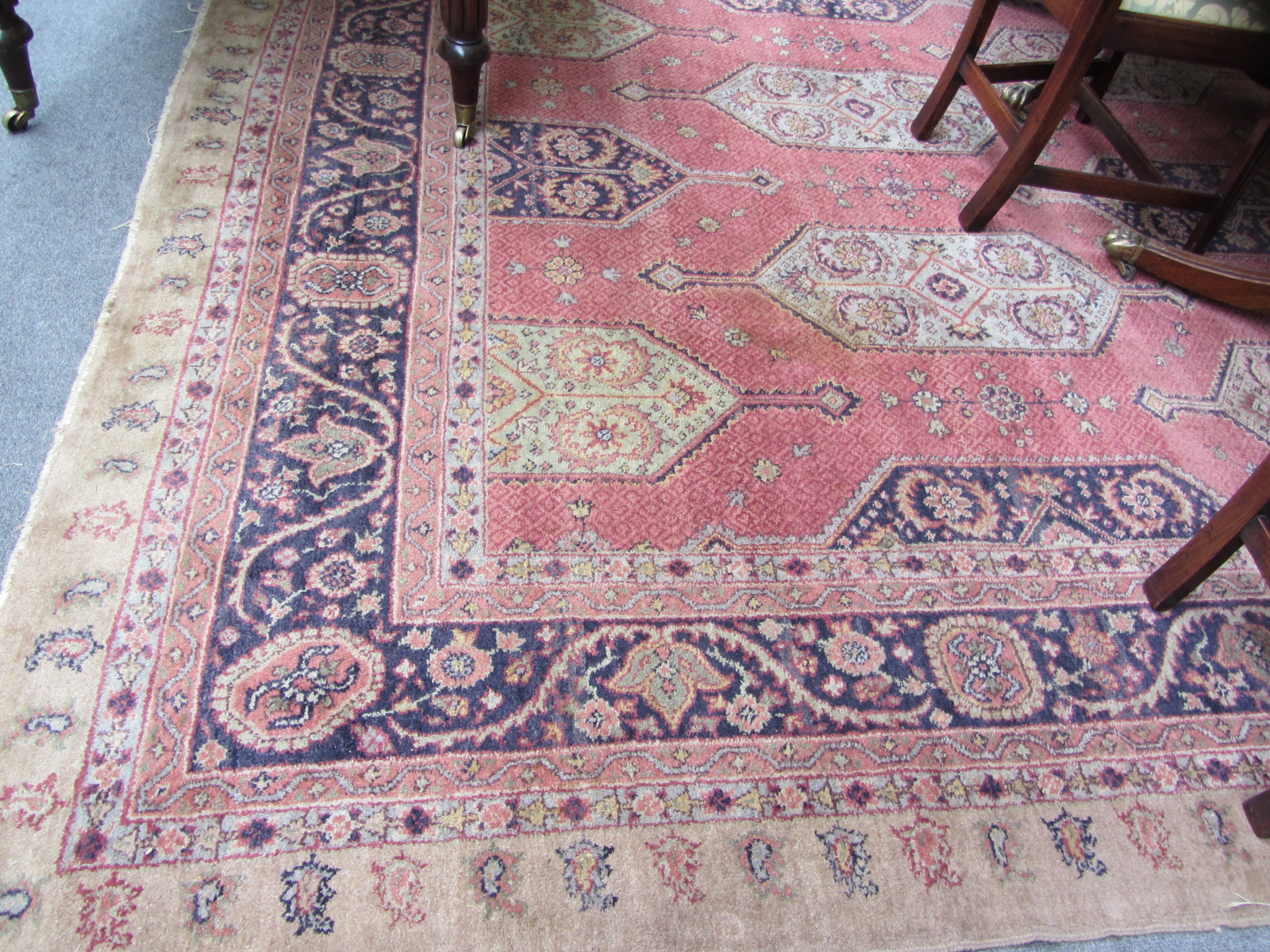 Appraisal: A Tabriz carpet Persian the pink field with lozenge medallions