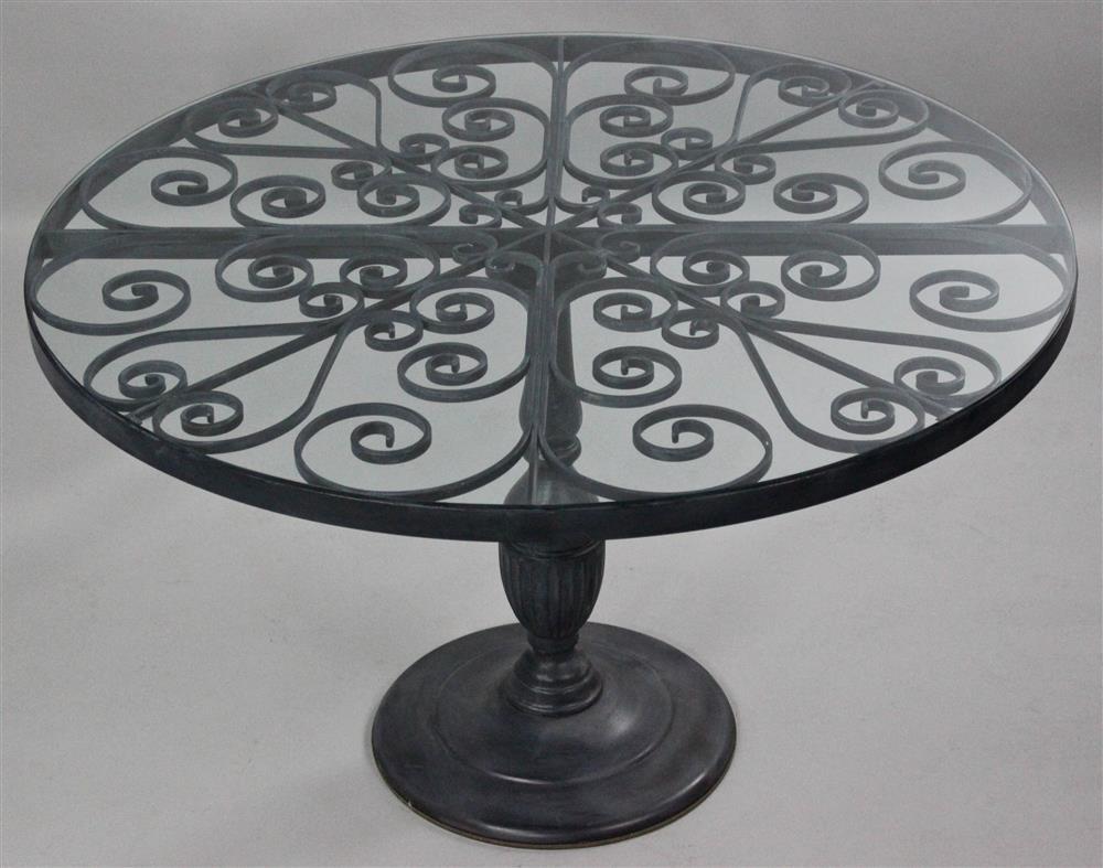 Appraisal: CIRCULAR DECORATIVE CAST METAL SCROLL BASE WITH GLASS TOP DINING