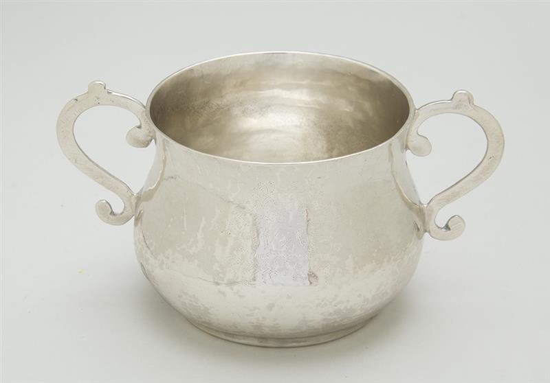 Appraisal: ELIZABETHAN STYLE ARMORIAL TWO-HANDLED SILVER CUP Bearing marks 'DG' beneath