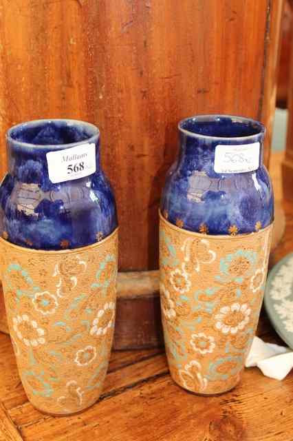 Appraisal: A PAIR OF DOULTON POTTERY VASES of tapering form with