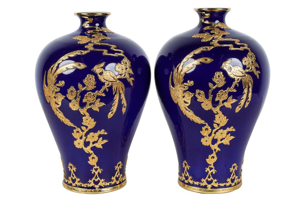 Appraisal: PAIR OF BRONZE-MOUNTED BLUE PORCELAIN VASESeach with six character mark