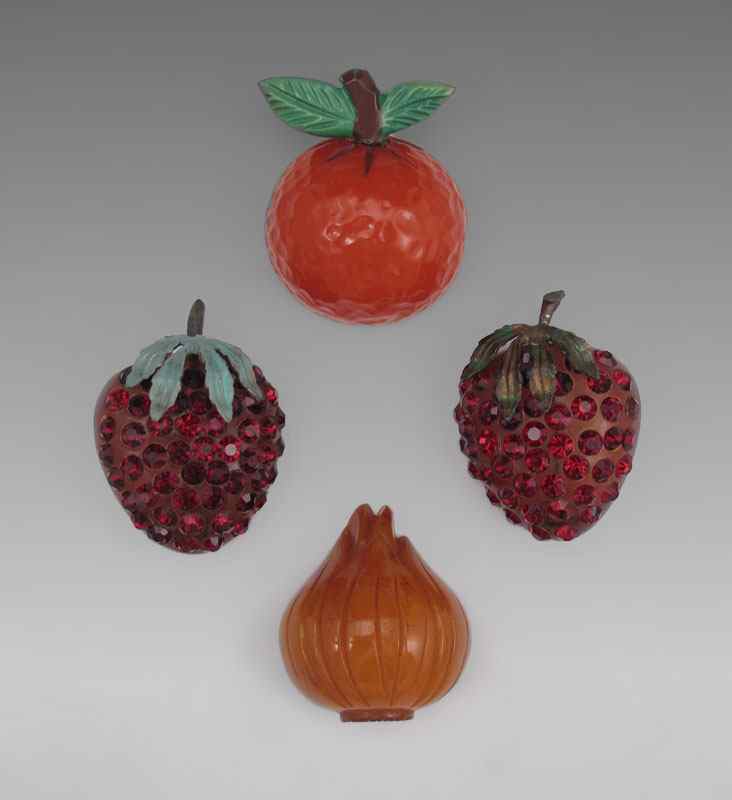 Appraisal: VINTAGE BAKELITE FRUIT AND VEGETABLE PINS Orange '' Onion ''