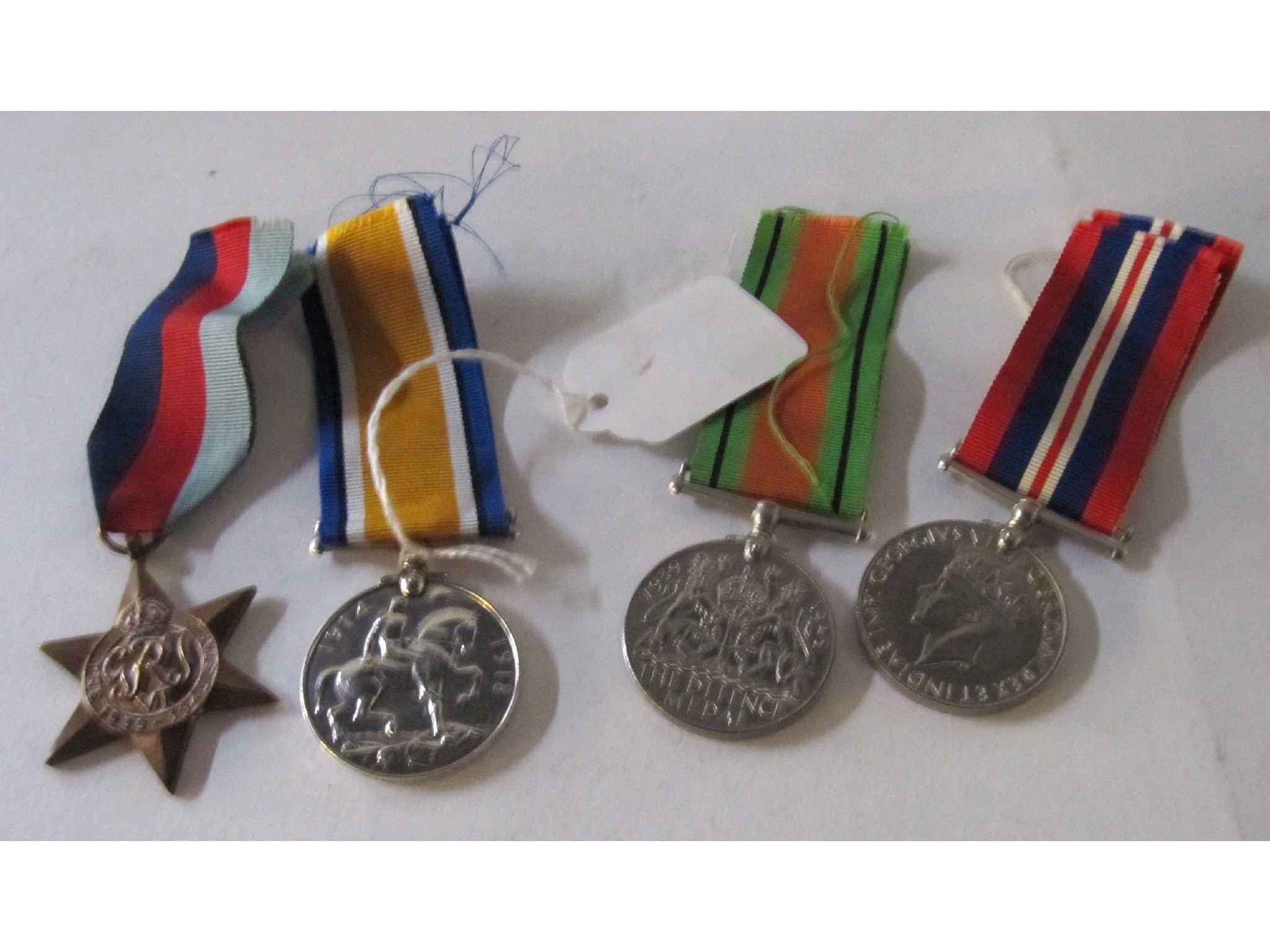 Appraisal: A lot comprising a WWI war medal to Pte J