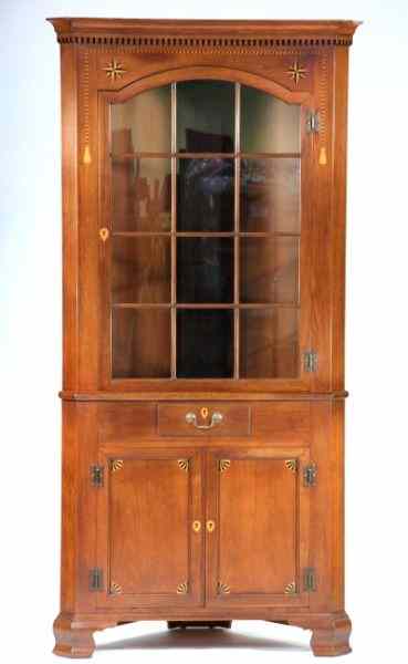 Appraisal: Inlaid Mahogany Corner Cupboard th century one piece form twelve