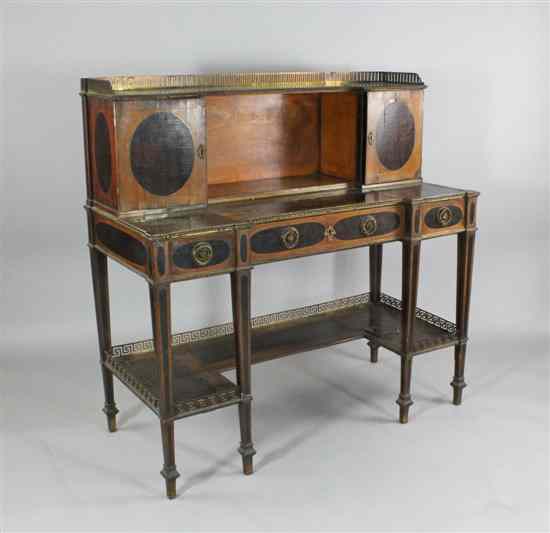 Appraisal: A George III satinwood and mahogany inverted breakfront desk with