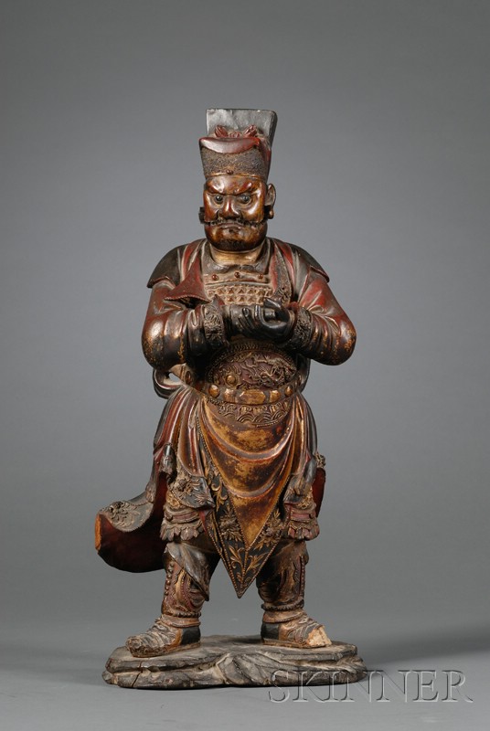 Appraisal: Polychrome Carved Wooden Figure of a Deity China Ming period