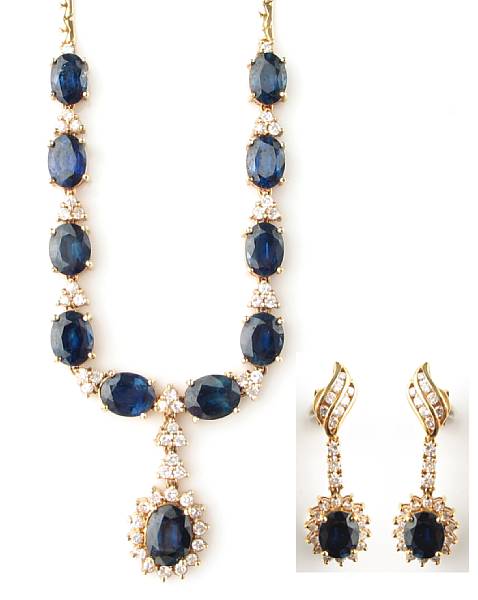 Appraisal: A diamond sapphire and karat yellow gold necklace with matching