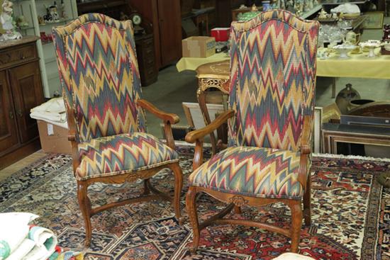 Appraisal: PAIR OF ARM CHAIRS Oak frames having knuckled arms and