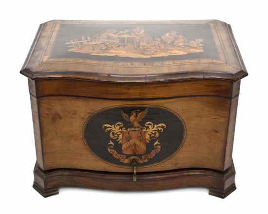 Appraisal: A Continental Marquetry Humidor the shaped rectangular hinged top opening