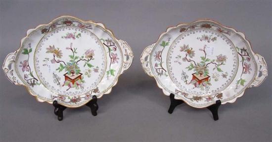 Appraisal: PAIR ENGLISH TH C CERAMIC TWIN-HANDLED DISHES Oval with scalloped