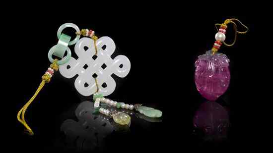 Appraisal: A Group of Tourmaline and Jade Toggles comprising a tourmaline