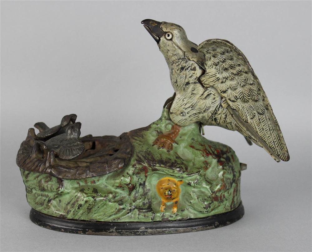 Appraisal: CAST IRON EAGLE AND EAGLETS MECHANICAL BANK J E STEVENS