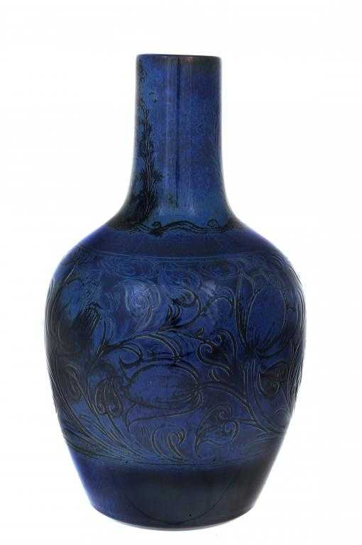 Appraisal: A PILKINGTON'S ROYAL LANCASTRIAN LUSTRE VASE of bottle shape carved