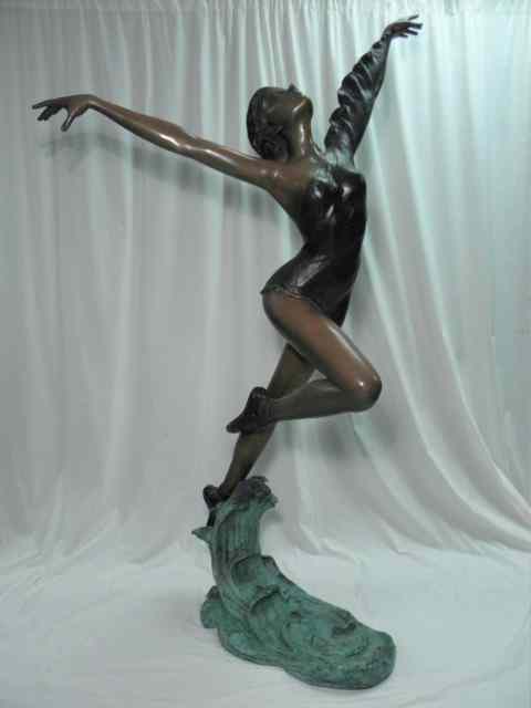 Appraisal: Bronze sculpture depicting a ballerina over water Condition minor signs