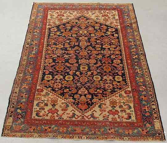 Appraisal: Hamadan oriental carpet blue field royal blue border and floral