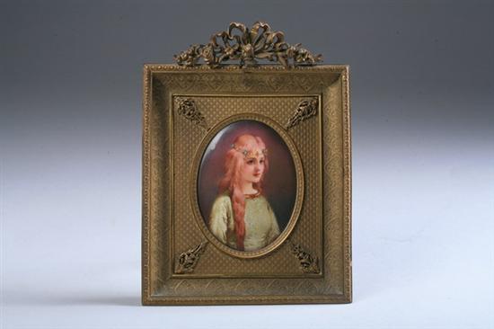 Appraisal: FRENCH ENAMELLED PORTRAIT PLAQUE th century Depicting a young maiden