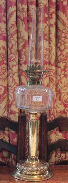 Appraisal: A VICTORIAN BRASS OIL LAMP with clear glass reservoir high