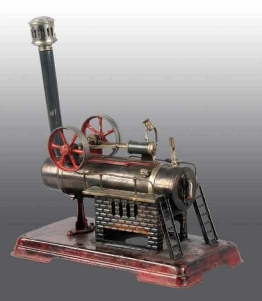 Appraisal: Doll No Overtype Steam Engine Description This toy includes double