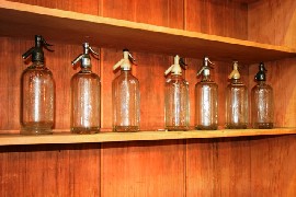 Appraisal: Seven vintage Shweppes soda siphons