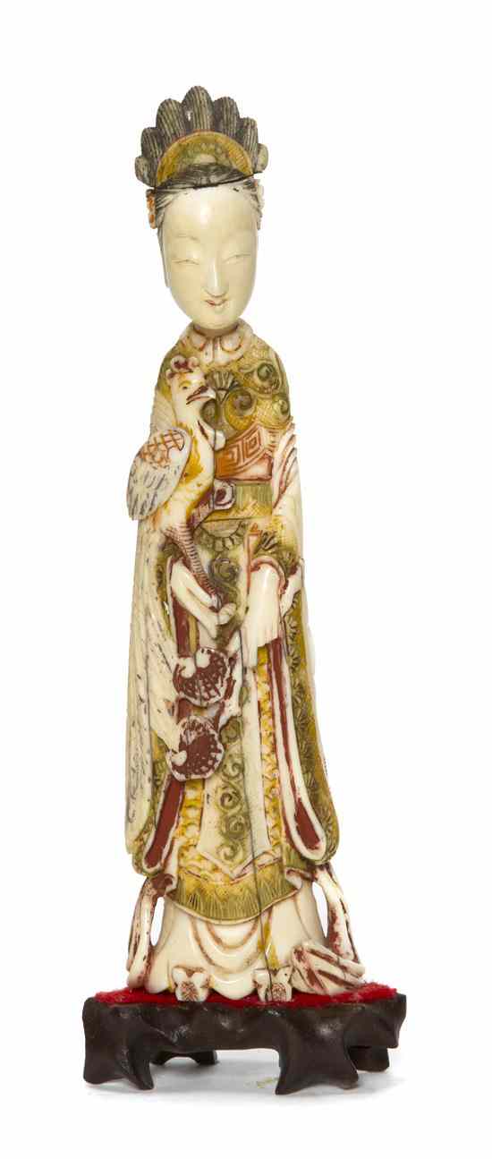 Appraisal: A Polychrome Decorated Ivory Figure depicting an empress standing in