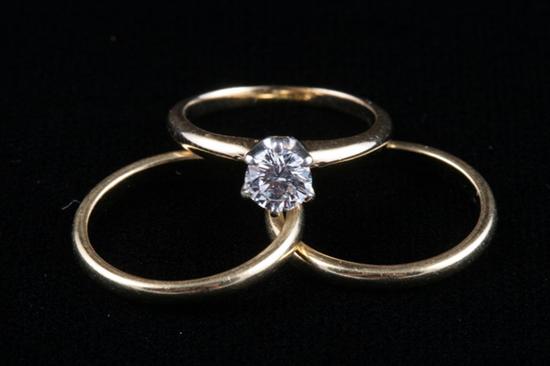 Appraisal: K YELLOW GOLD AND DIAMOND SOLITAIRE RING AND TWO K