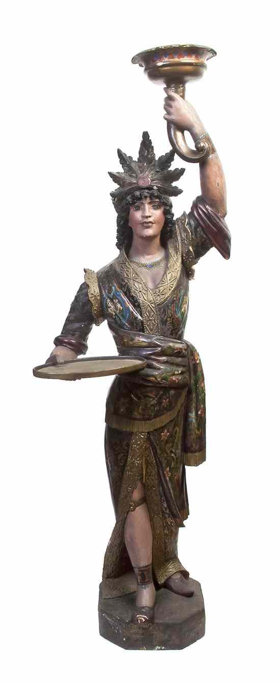 Appraisal: An Italian Carved and Polychrome Decorated Figure depicting a standing