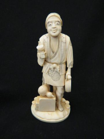 Appraisal: Japanese Carved Ivory Figurine of Man with Drum gourd box