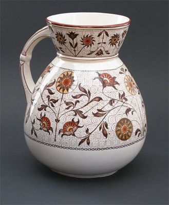 Appraisal: A Wedgwood earthenware ewer printed with Aesthetic Movement flowers in