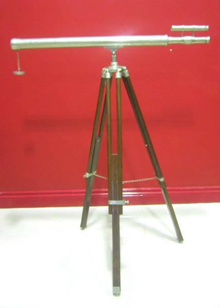 Appraisal: A SILVER CASED TELESCOPE WITH WOODEN TRIPOD STAND A SILVER