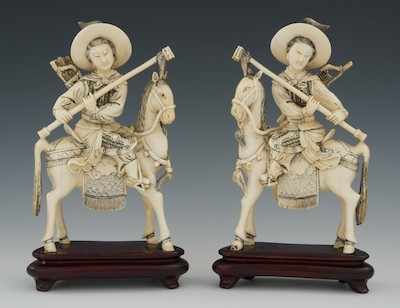 Appraisal: A Pair of Carved Ivory Figures on Horses Chinese A