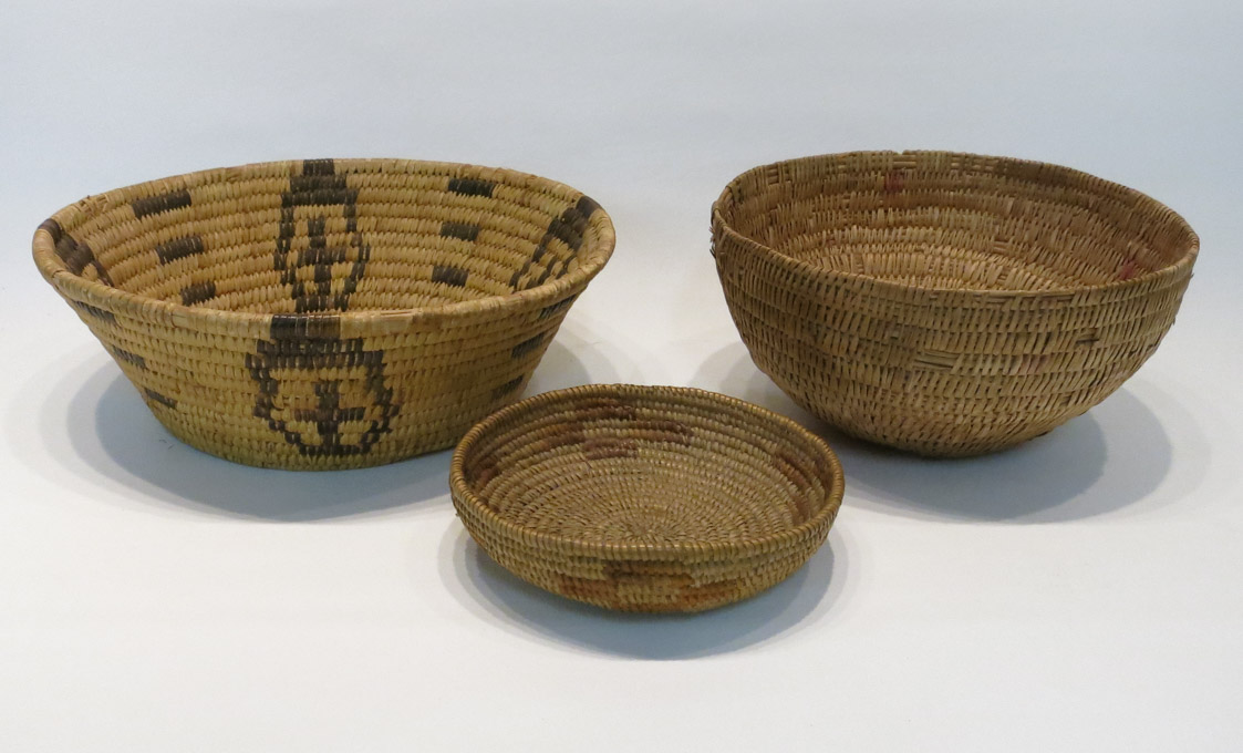 Appraisal: THREE SOUTHWEST NATIVE AMERICAN BASKETS the first a shallow California