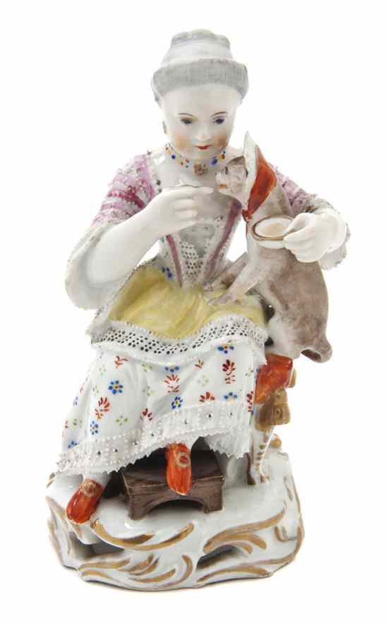 Appraisal: A Royal Vienna Porcelain Figural Group depicting a seated lady