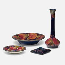 Appraisal: Moorcroft Pottery Collection of three Pomegranate works c - glazed