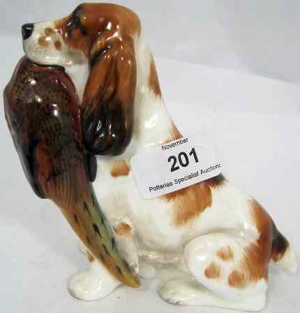 Appraisal: Royal Doulton Model of a Seated Brown White Spaniel With