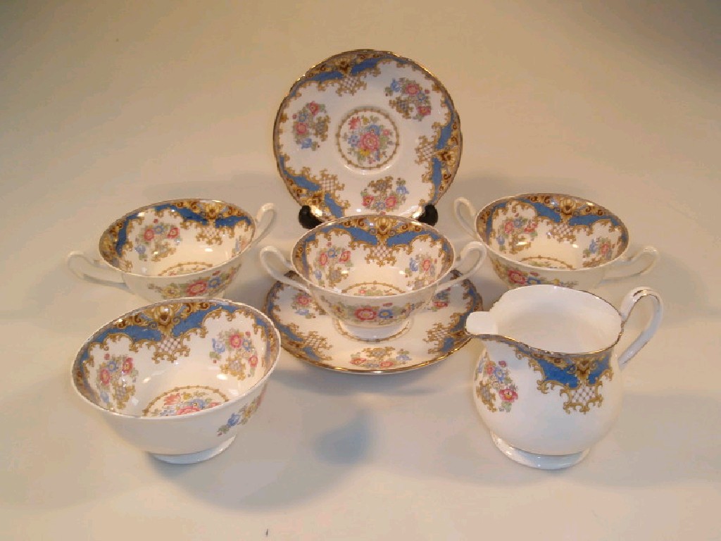 Appraisal: Three Shelley Sheraton soup cups and stands and matching cream