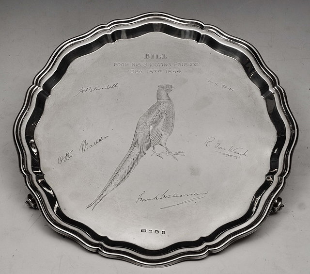 Appraisal: A GEORGE V SILVER SALVER with Chippendale border scroll and