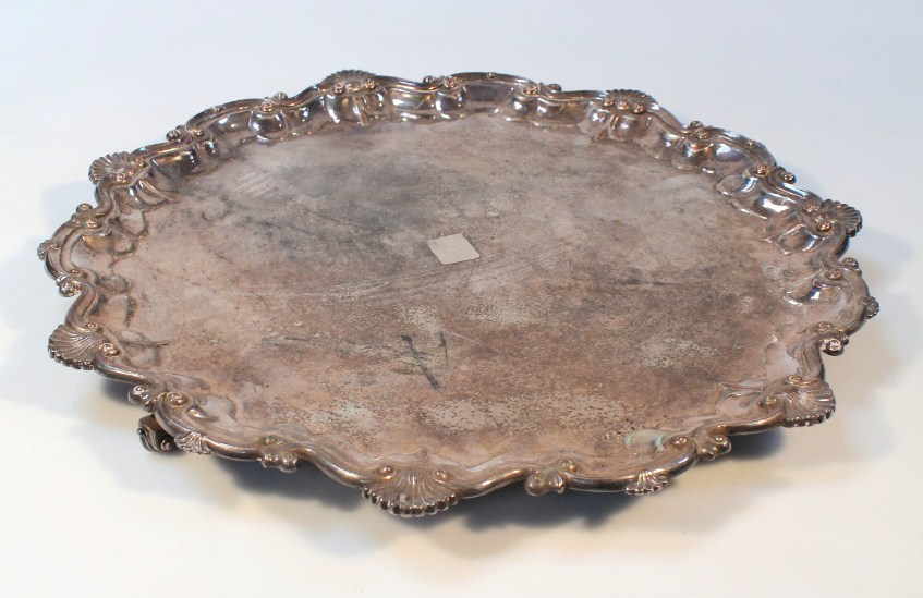 Appraisal: A thC silver plated salver with a piecrust outline broken