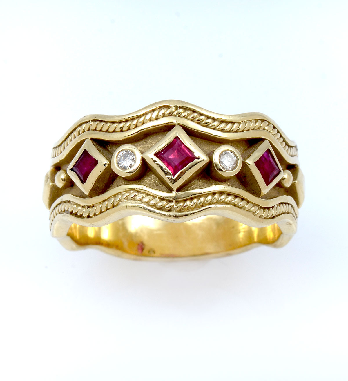 Appraisal: K ETRUSICAN REVIVAL RUBY DIAMOND RING K yellow gold ring