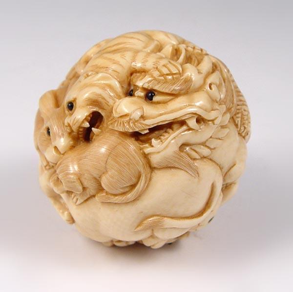 Appraisal: CHINESE CARVED IVORY ZODIAC BALL Carved ball showing figures of