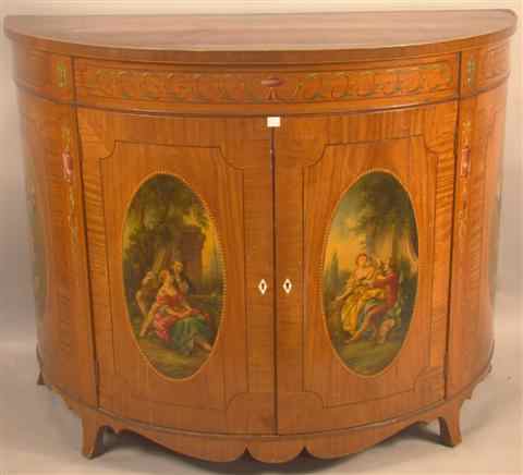 Appraisal: EDWARDIAN PAINTED SATINWOOD DEMILUNE CABINET the top painted with a