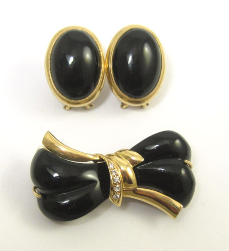 Appraisal: BLACK ONYX AND FOURTEEN KARAT GOLD BROOCH AND EARRING GROUP