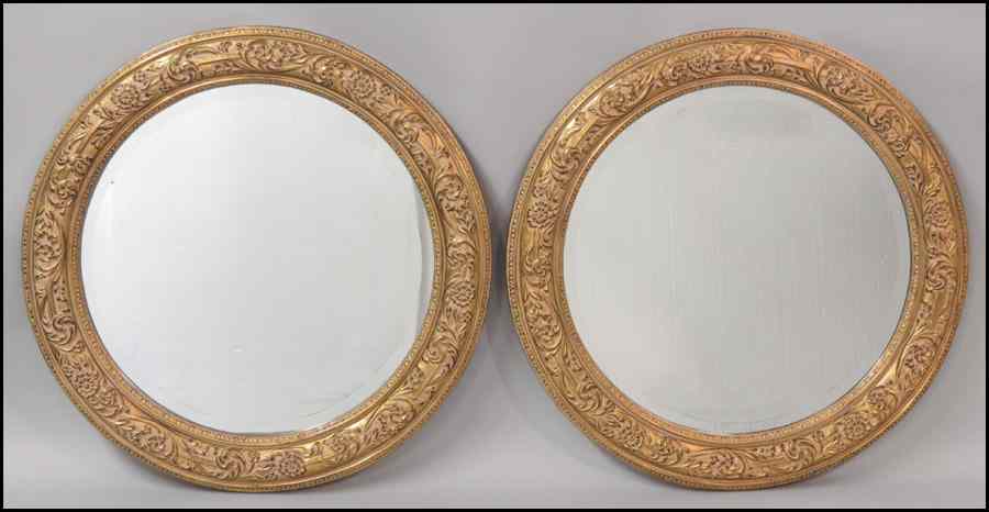 Appraisal: PAIR OF ROUND FAUX GILT MIRRORS Diameter '' Condition No