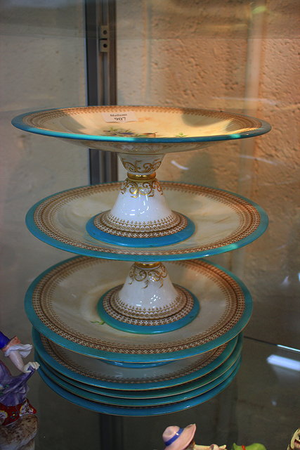 Appraisal: A ROYAL WORCESTER PART DESSERT SERVICE consisting of two high