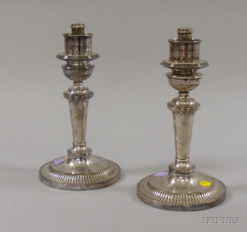 Appraisal: Pair of Sheffield Plate Candlesticks th century Georgian-style weighted with