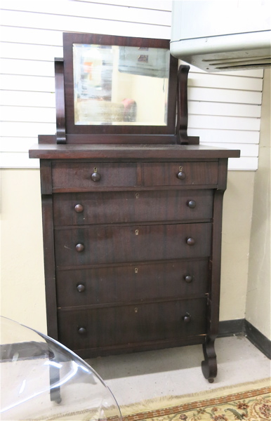 Appraisal: EMPIRE REVIVAL MAHOGANY DRESSER American c the tall chest featuring