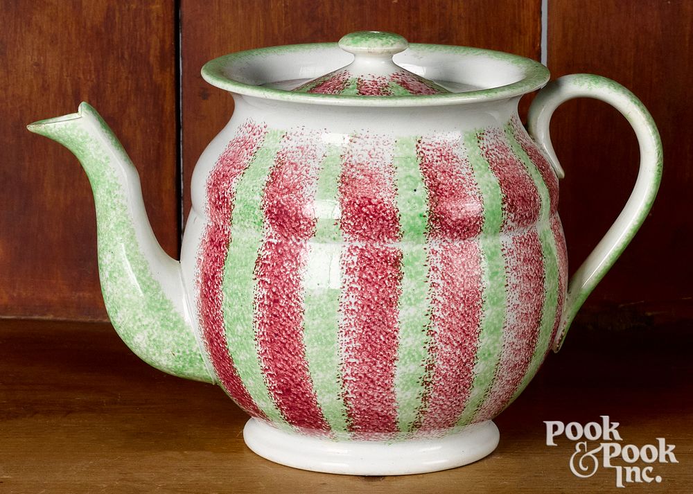 Appraisal: Red and green rainbow spatter teapot Red and green rainbow