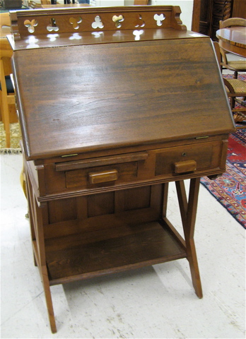 Appraisal: VICTORIAN WALNUT SLANT-FRONT WRITING DESK American Eastlake Gothic influence late