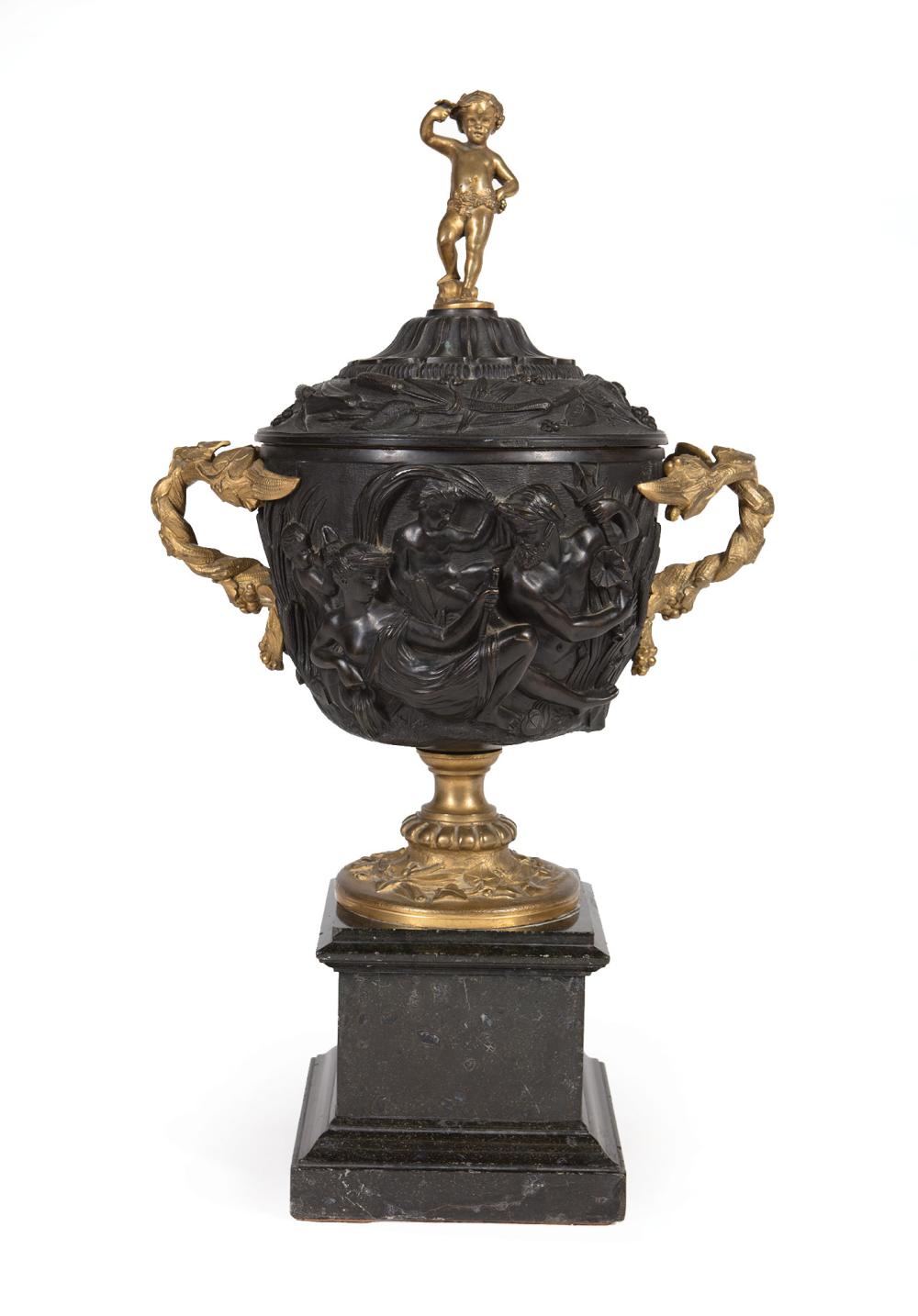 Appraisal: Continental Gilt and Patinated Bronze Covered Urn th c putto